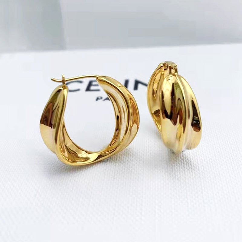 Fluid Twist Huggie Hoop Earrings in 18k Yellow Gold - Ideal Place Market